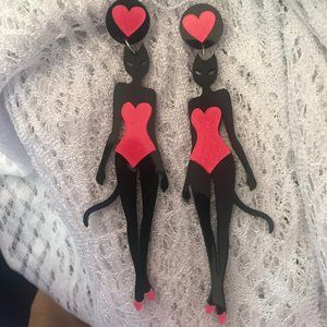 Cat Woman, Tall Black Cat in a Red swimsuit, Red Shoes, Red Heart above …